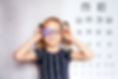 Happy little girl wearing glasses and eye patch or occluder, amblyopia (lazy eye) treatmen