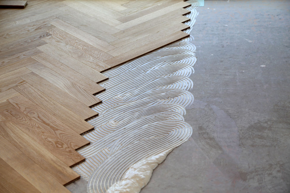 worker-laying-parquet-flooring-and-installing-wood-2023-11-27-04-51-43-utc.jpeg