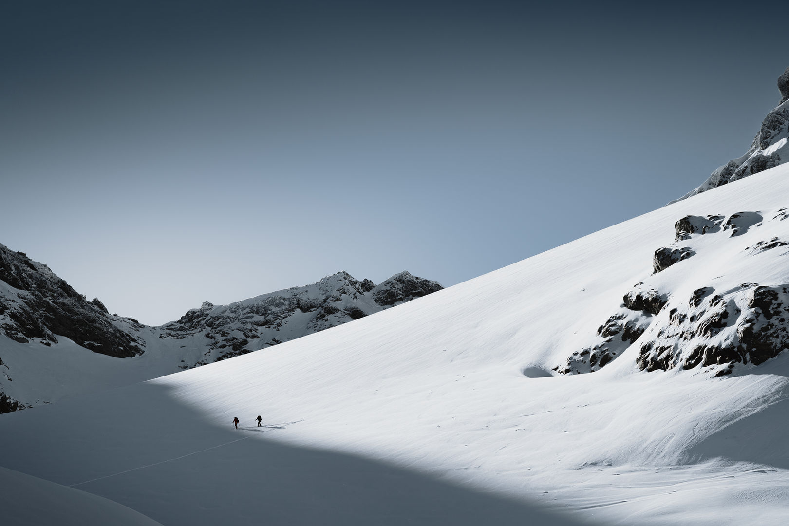Skitouring on a glacier in silvretta in winter on a beatiful day in tyrol