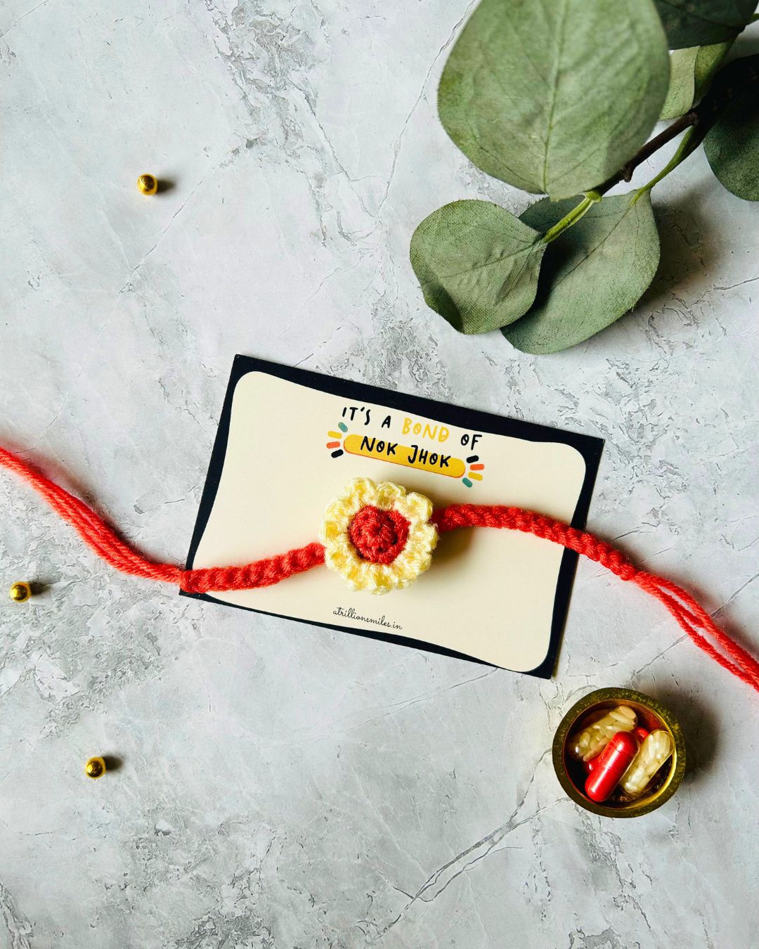Daisy Flower Crochet Rakhi (Orange)