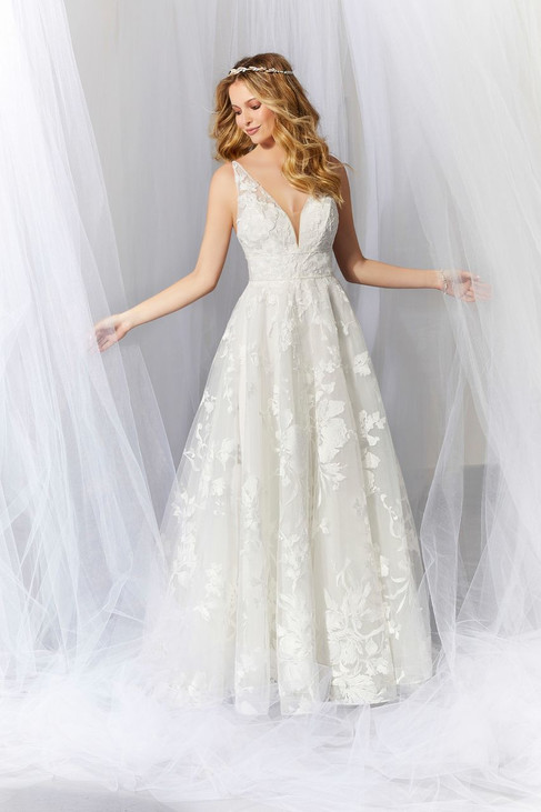 6932 £825
