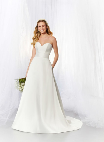 6934 £897