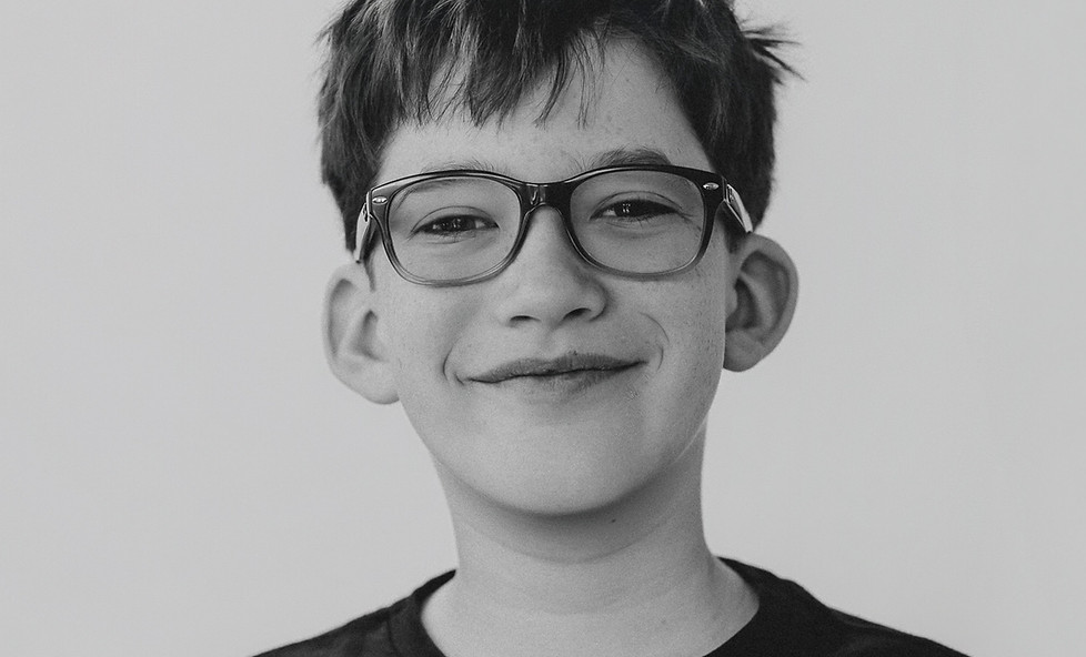 student smiling during school portraits