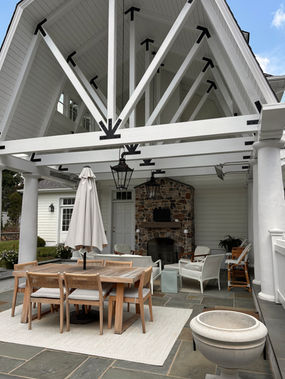 Outdoor living pavilion with fireplace