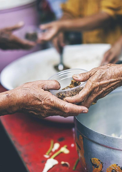 hands-of-poor-people-asking-for-food-from-volunteers-helping-concept-of-food-donation-free