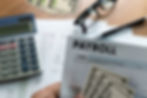 PAYROLL-Businessman-working-Financial-accounting-concept-690719352_2125x1416.jpeg