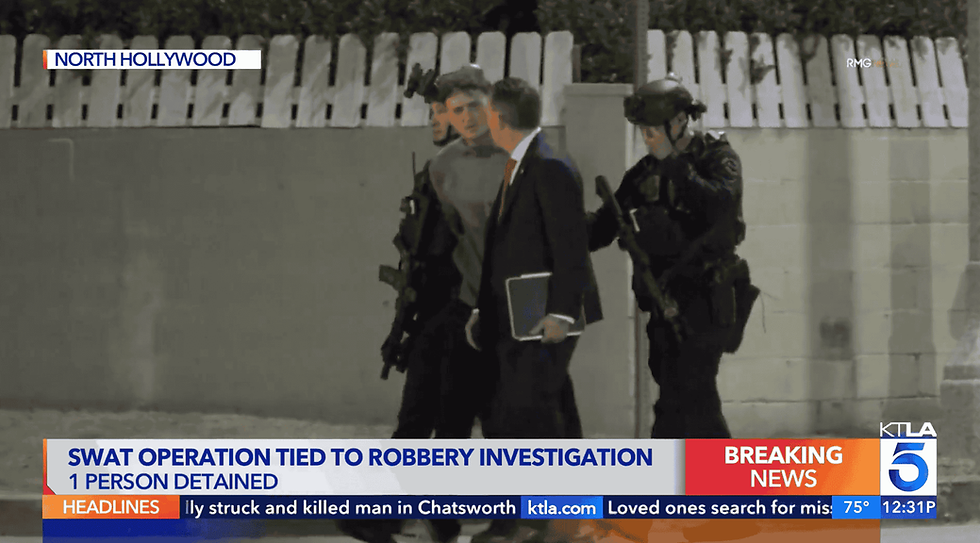 Swat operation tied to robbery investigation news headline