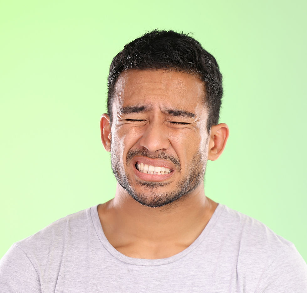Man, face and pain or hurt in studio with toothache, gum disease and inflammation with fac