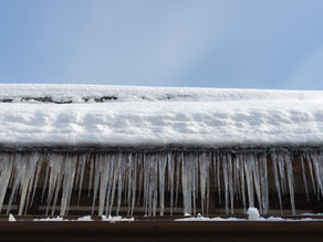 Ice damns build up on roof
