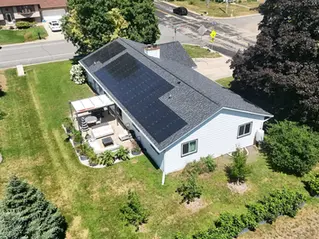 Aerial view of a Verona, WI home with a solar shingle roof