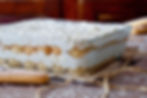 Layered Tiramisù Waterford in a glass dish with ladyfingers