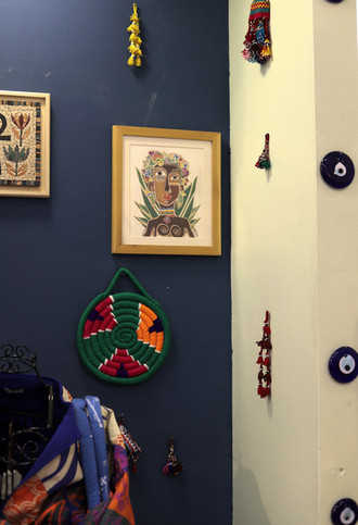 blue wall with photos, Egyptian fashion brand GetPalma