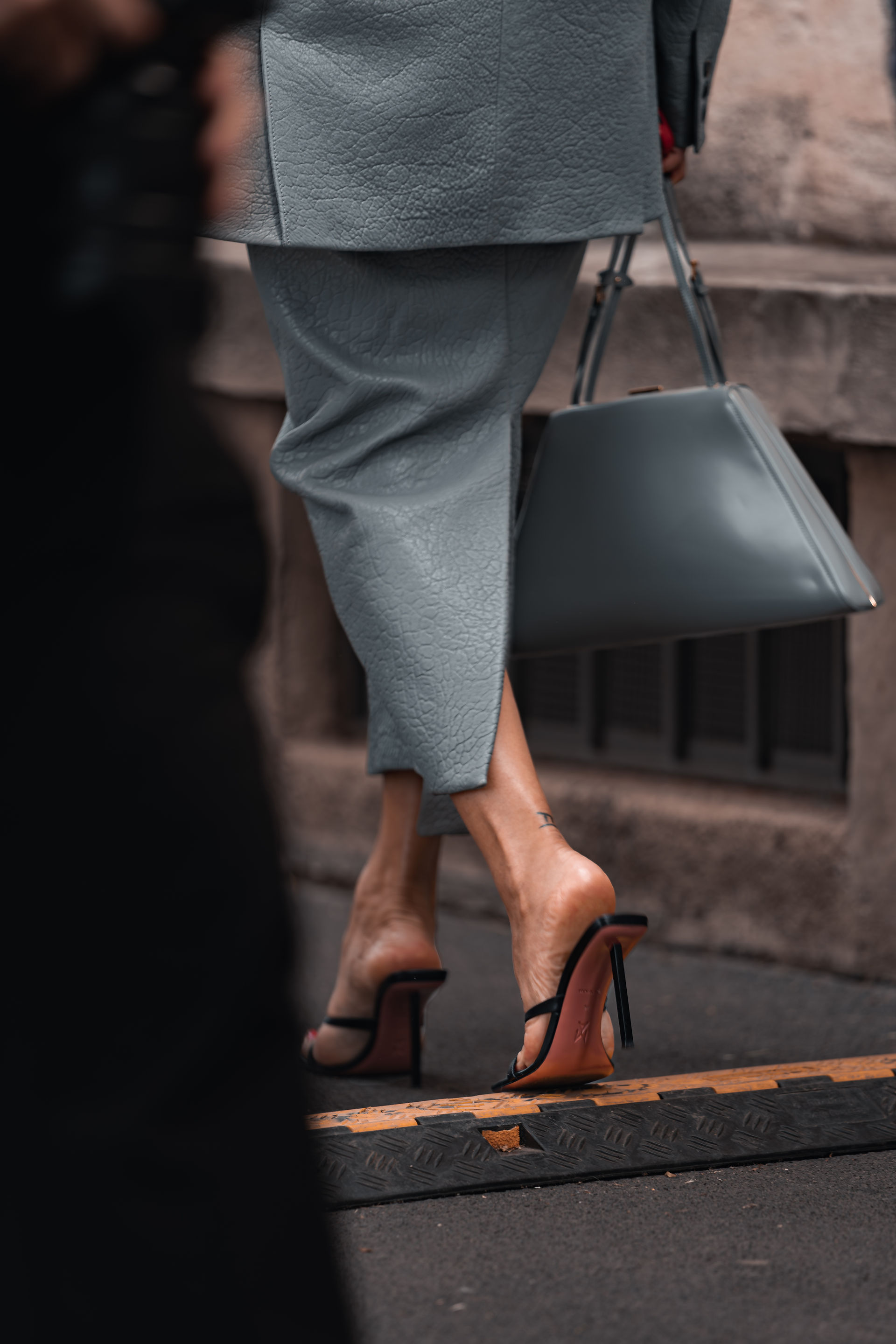 Amina Muaddi, shoes detail, outside Prada | Photo Riccardo Perdisa