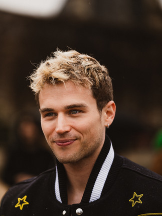 Brandon Flynn, photographed by Riccardo Perdisa outside Off-White during Paris Women's Fashion Week 2024