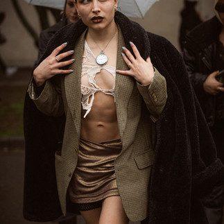 photographed by Riccardo Perdisa outside Prada show Fall Winter 24/25 in Milan