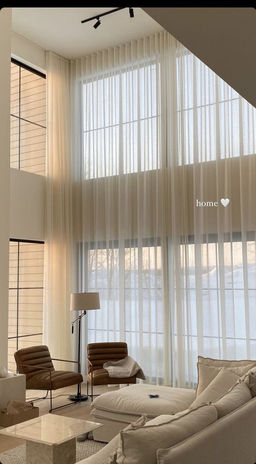 Sheer curtain on high window