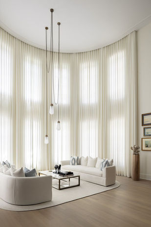 Sheer curtain on tall windows