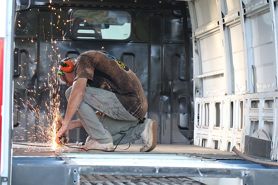 grinding the floor out of the van