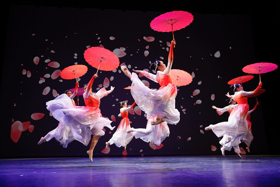 "Red Umbrellas Under Youth" — Photo taken by Xinqun Zheng.