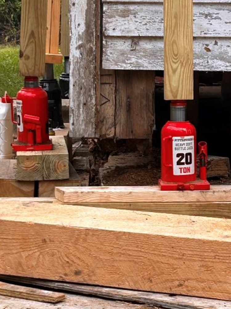 A 6x12 red oak beam awaits placement