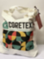 Cream tote bags with a colorful company logo and the words Coretext the science of communication www.coretext.com.au