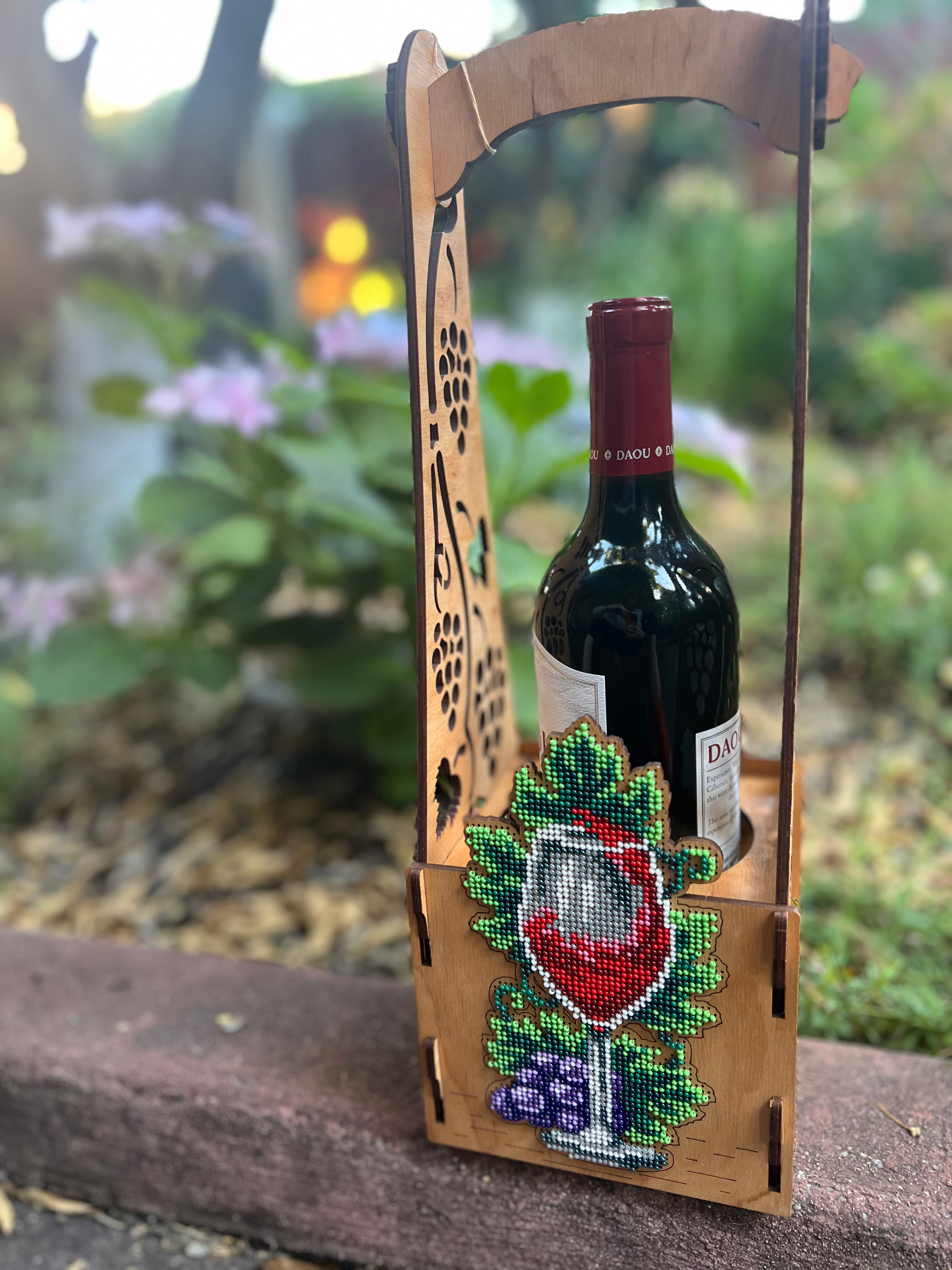 Beaded wooden bottle holder