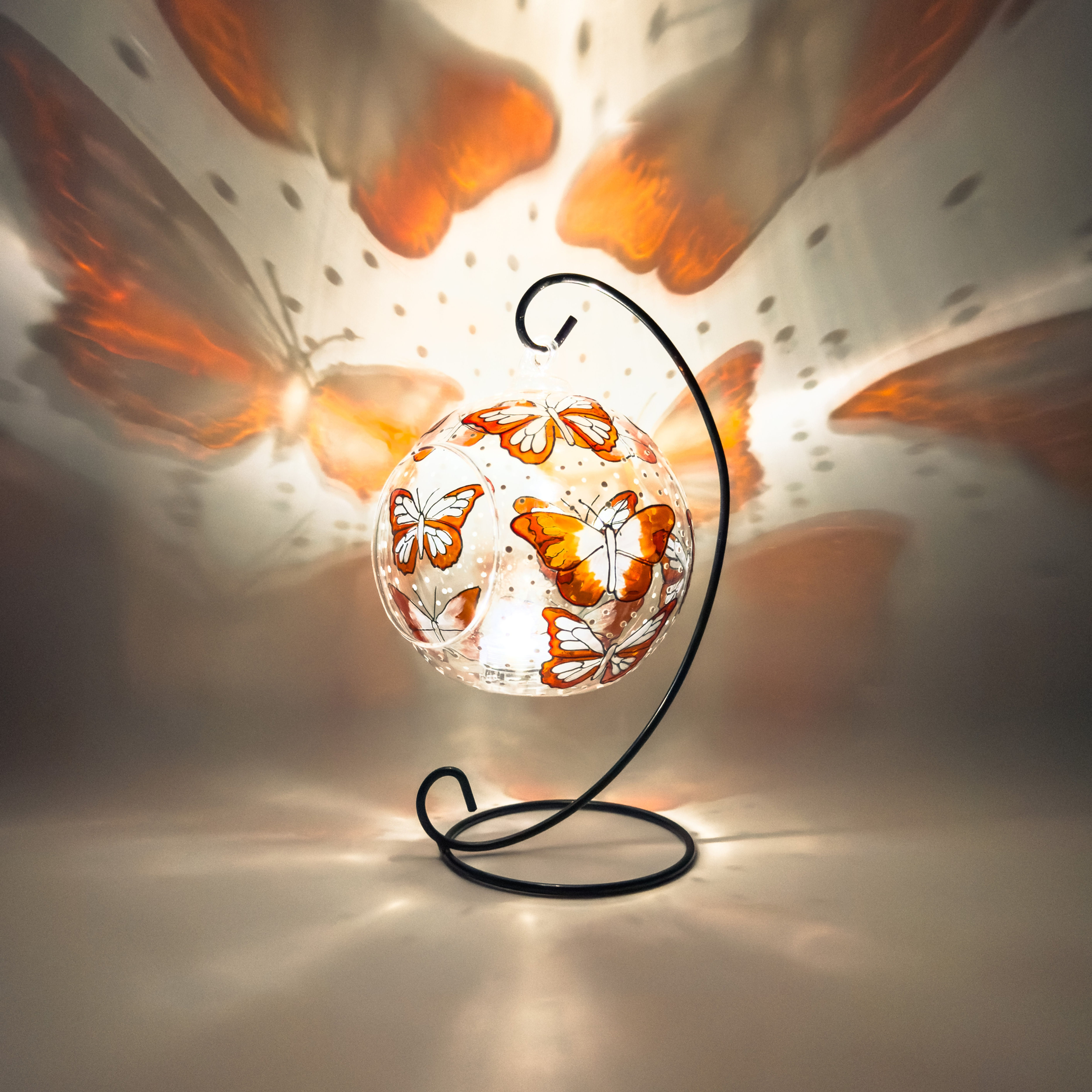 hand painted butterfly glass candle holder in stain glass effect with pearl and orange