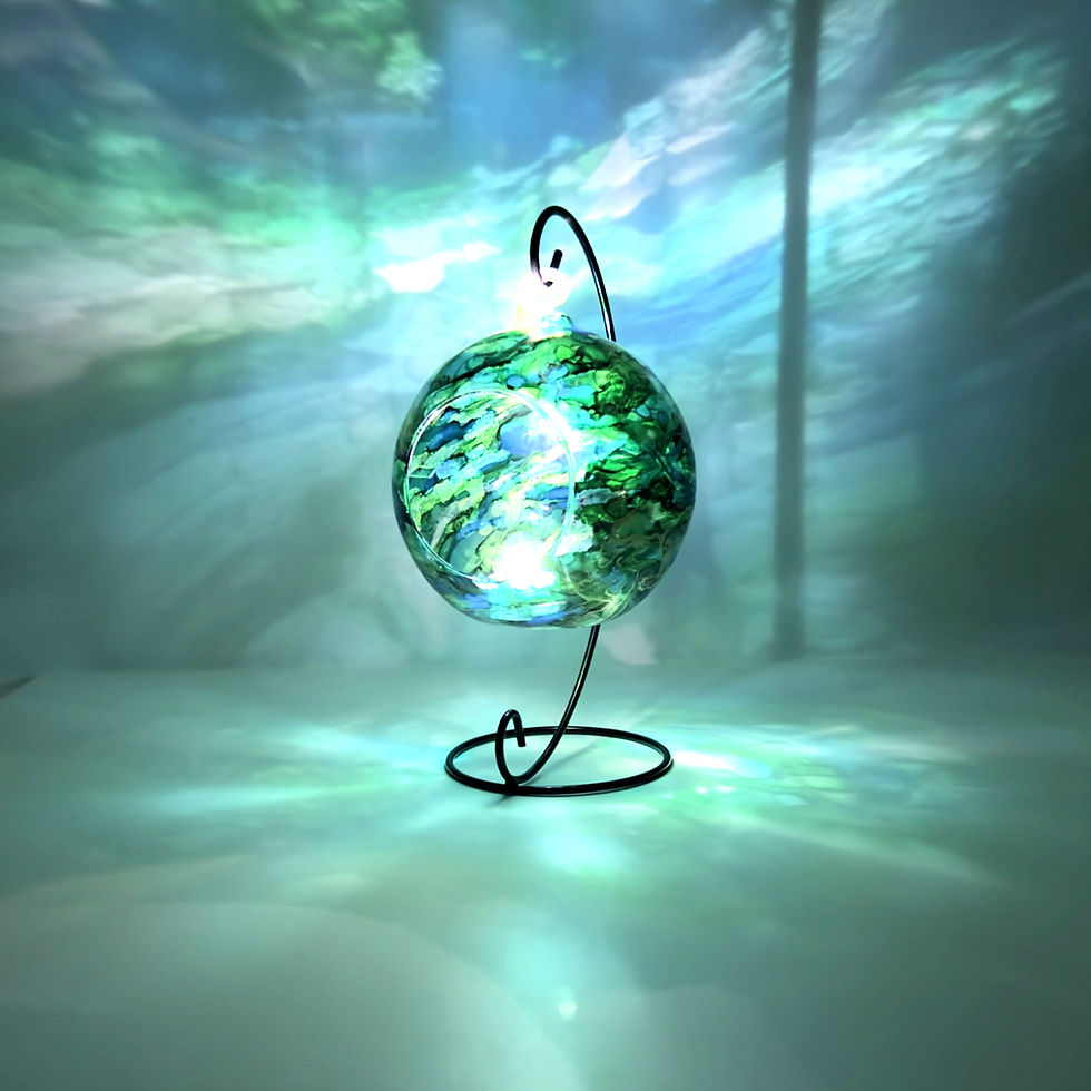Tropical Ocean Glass Candle Holder hand painted in rich shades of teal, green, and shimmering gold