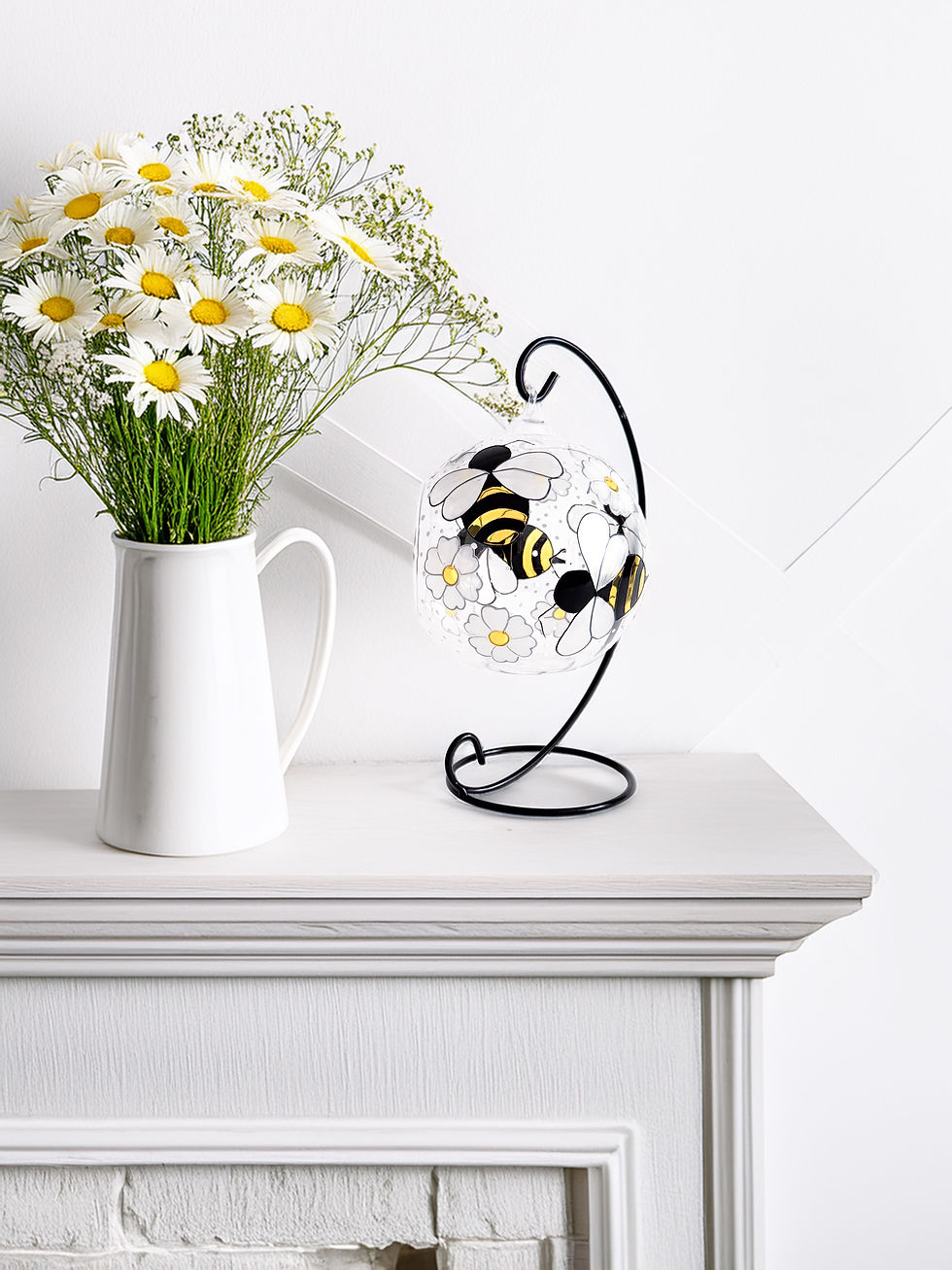 Thumbnail: hand painted bees and daisies glass candle holder, creates a mesmerising show when lit in the dark