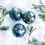 Thumbnail: This green, teal and gold set of 3 glass baubles are hand painted in shades of green, teal and gold accents