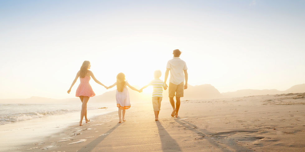 Family Walking On the Beach