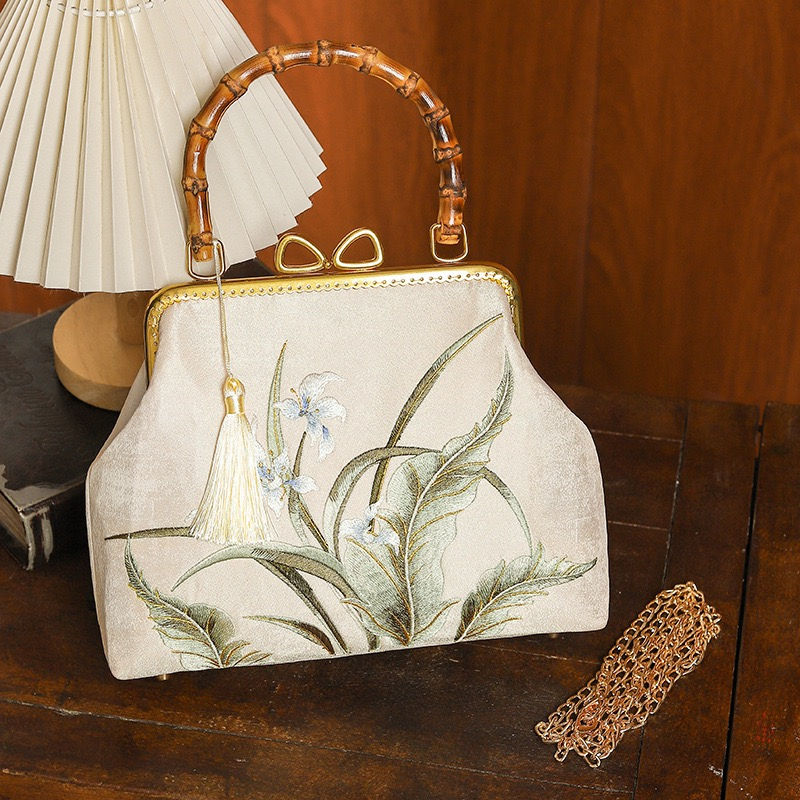 Thumbnail: Elegant Bamboo-Wind Embroidered Handbag This exquisite vintage handbag features