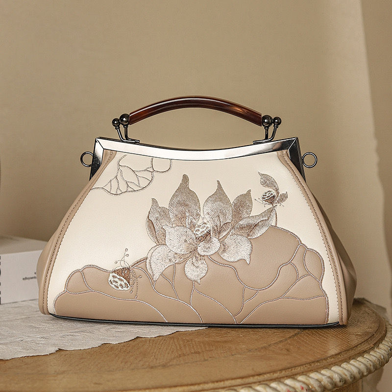 Microfiber Leather Embroidered Handbag This beautifully embroidered handbag made