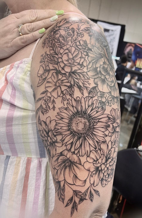 half sleeve floral tattoo black and grey sunflower poppies tattoo