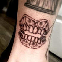 teeth tattoo