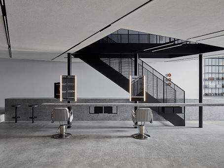 luxury hair salon interior in Dubai with monochrome walls at CHALK