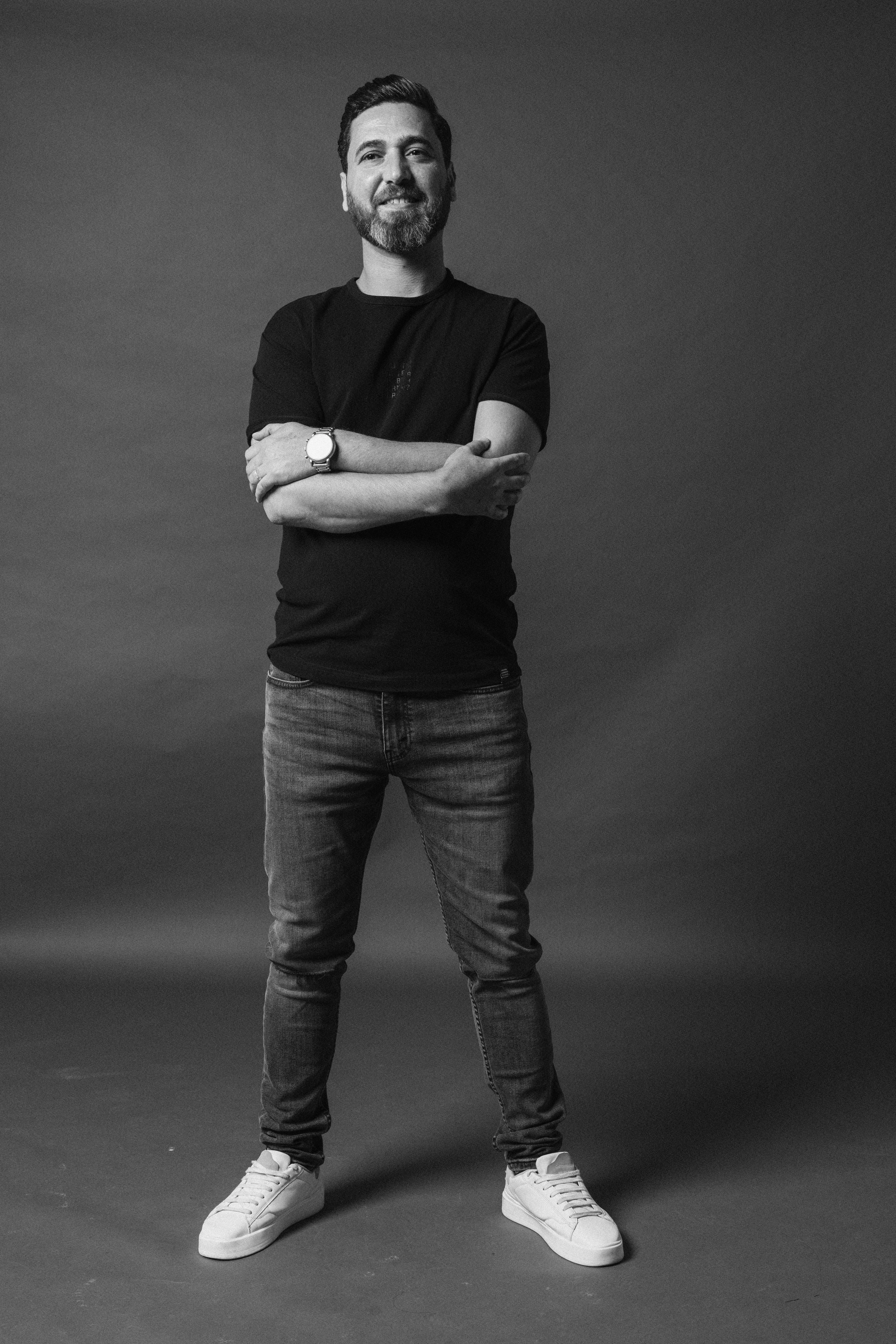 Fayeez, Master Barber at CHALK Dubai, specializing in precision fades and grooming.