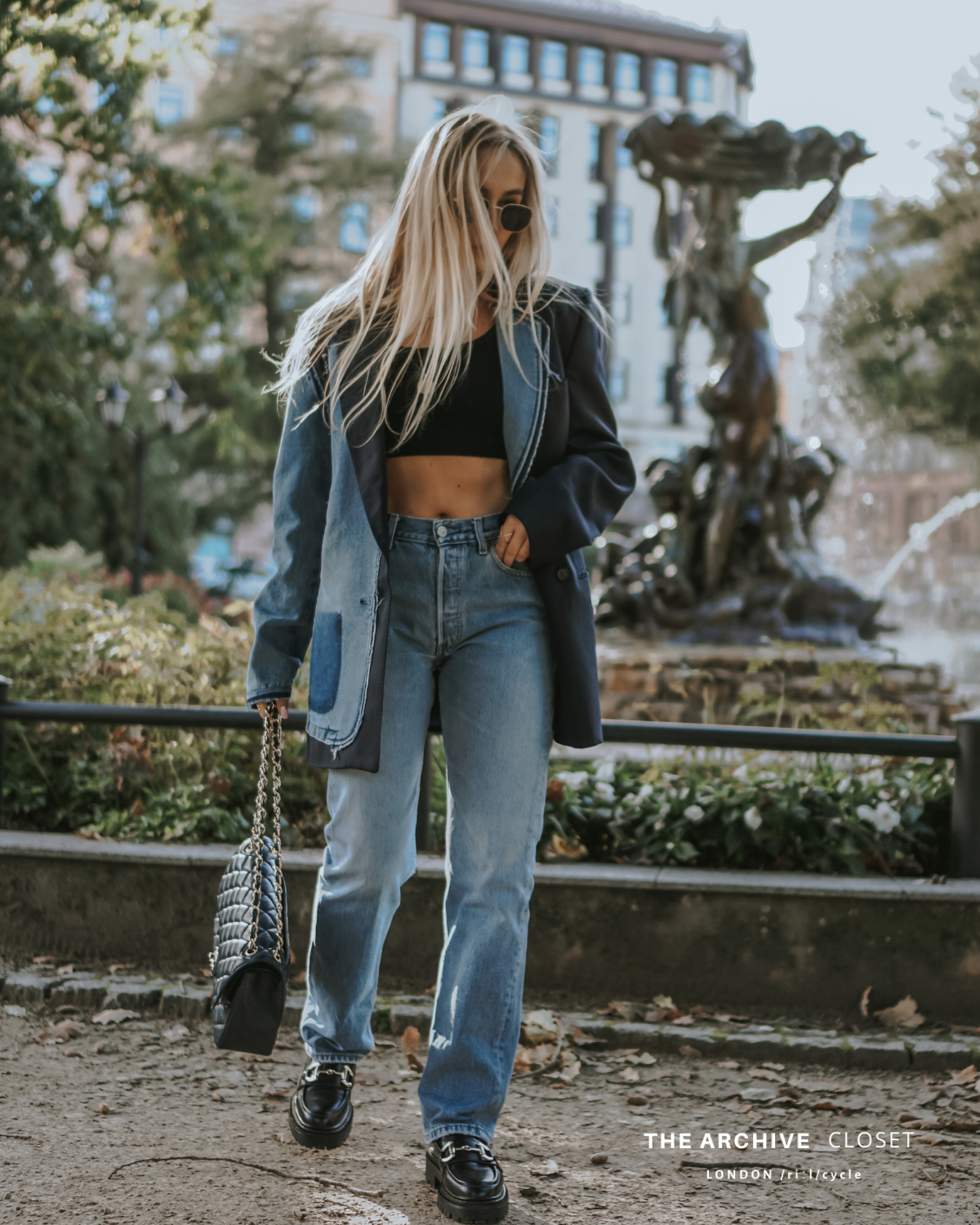 Deconstructed pinstriped blazer with denim back detail