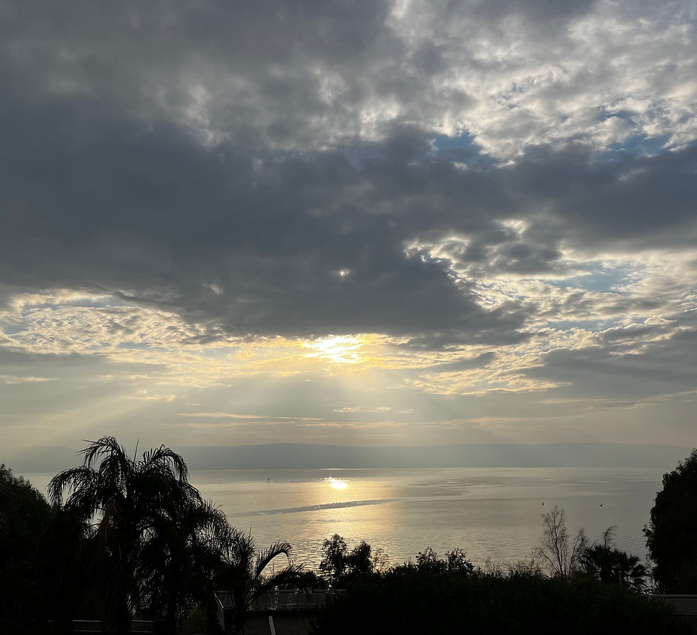 Sun rises over the Sea of Galilee. 