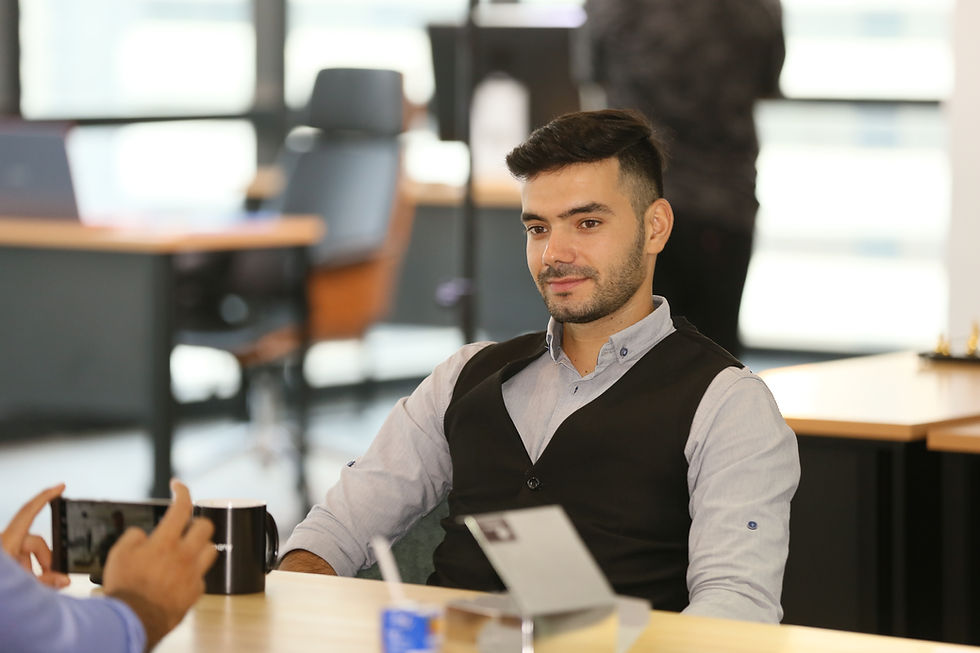 thoughtful-businessman-drinking-coffee-while-sitting-table.jpg