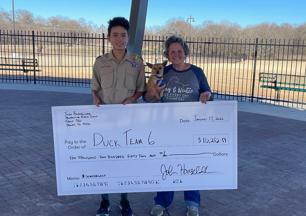 Presentation of $10,000 check to Duck Team 6