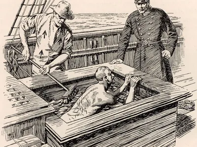 Man being attacked by a brush by two torturers