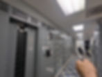 electrical inspector pointing at problem area