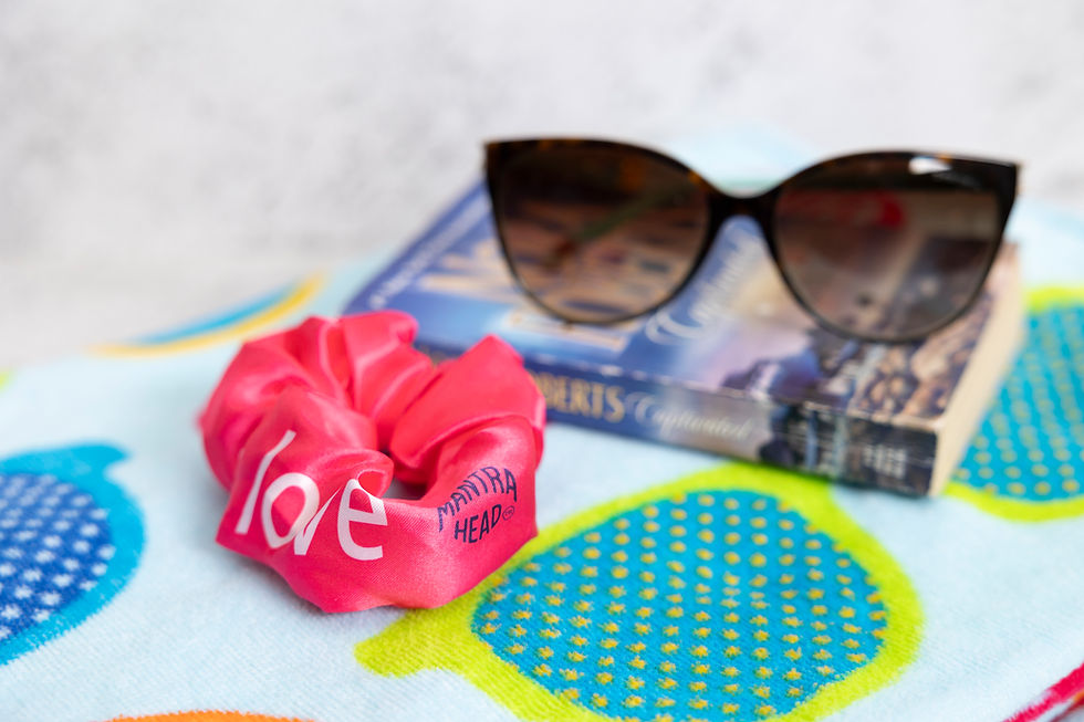 Thumbnail: Beach day includes bringing your soft hair scrunchie, book, and sunglasses