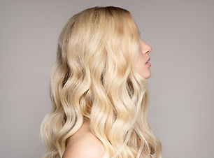 Blonde Welliges Haar