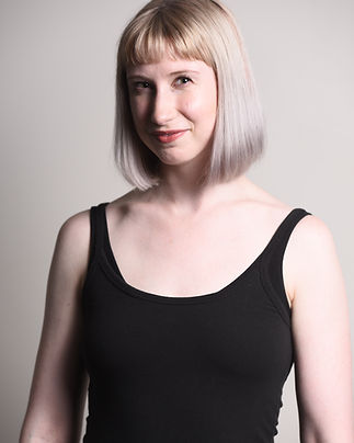 Laura Becker is a storyteller in every capacity. She trained for ten years at Martell School of Dance in Akron, Ohio in a wide variety of styles and holds a bachelor's degree in Theatre with a focus in Non-profit Arts Administration from Baldwin Wallace University. By day, she is the Office Coordinator at Infinity Visual and Performing Arts. She is also a writer of songs and fiction and teaches songwriting at Infinity as well. Her other interests include roller skating and historic Viking reenactment. She believes that creativity is innate within all people and has the power to transform both the creator and the audience. Original art is vital to communities and audiences of every size, especially small ones, and she can't wait to share what she has to offer with hers.