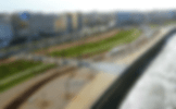 Photo of Undulating Landscape in front of the Cityscape