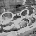 A 34 week premature baby in an isolette