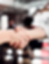 a-midsection-of-young-businesswomen-shaking-hands-2024-10-18-13-59-13-utc.jpg