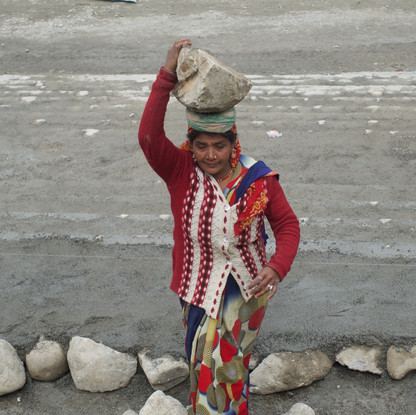 Woman With Rock